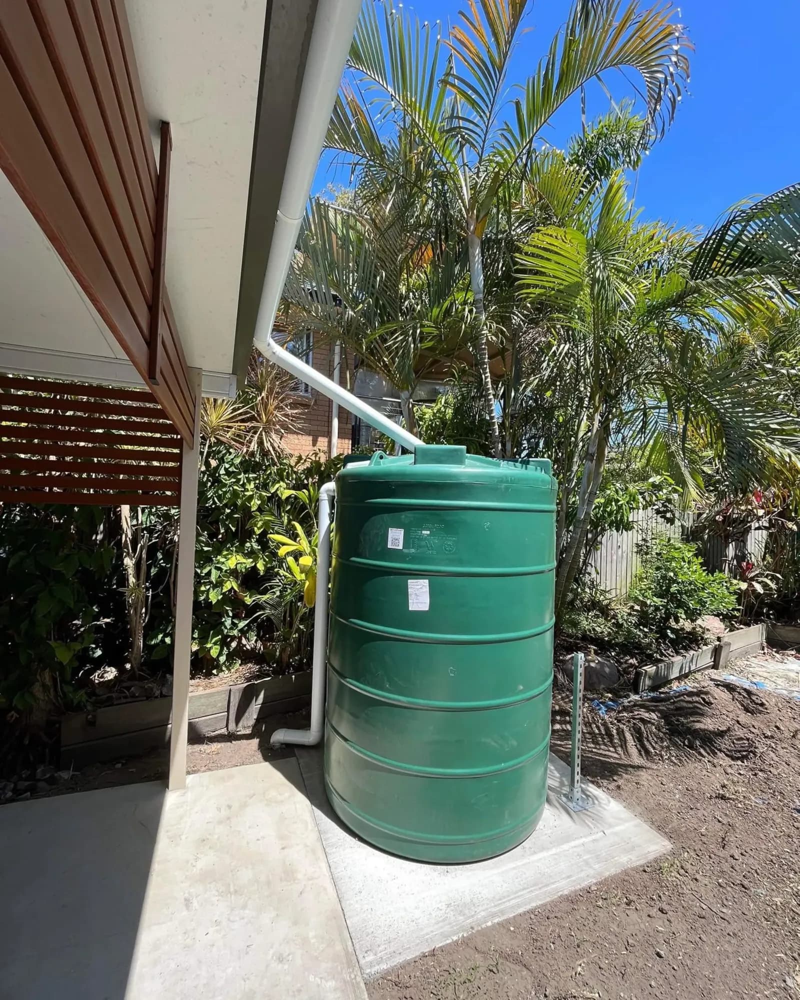 Rainwater tank installed on a concrete slab