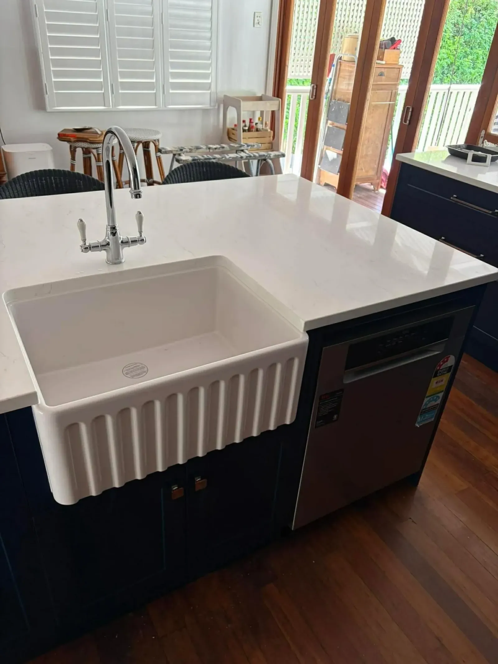 Butler's sink and mixer tap installed in a new kitchen